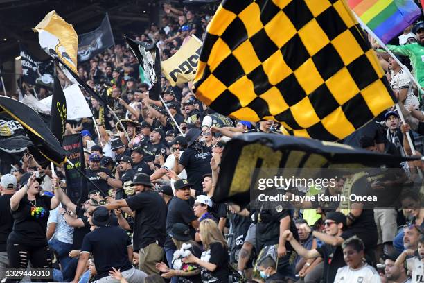 Los Angeles FC fans celebrate after a goal against Real Salt Lake at Banc of California Stadium on July 17, 2021 in Los Angeles, California.