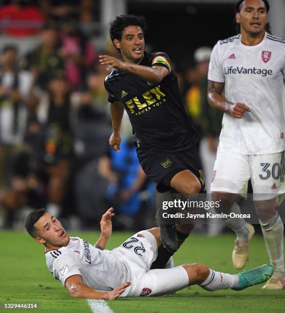 Aaron Herrera of Real Salt Lake defends a shot on goal by Carlos Vela of Los Angeles FC in the second half of the game at Banc of California Stadium...