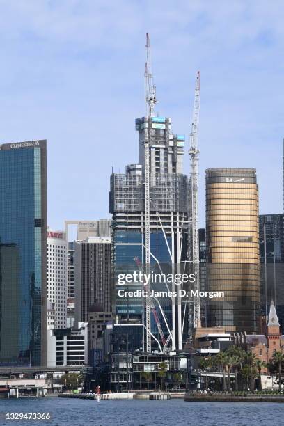 Cranes on buildings sit idle in the CBD on July 19, 2021 in Sydney, Australia. Lockdown restrictions have been further tightened as NSW continues to...