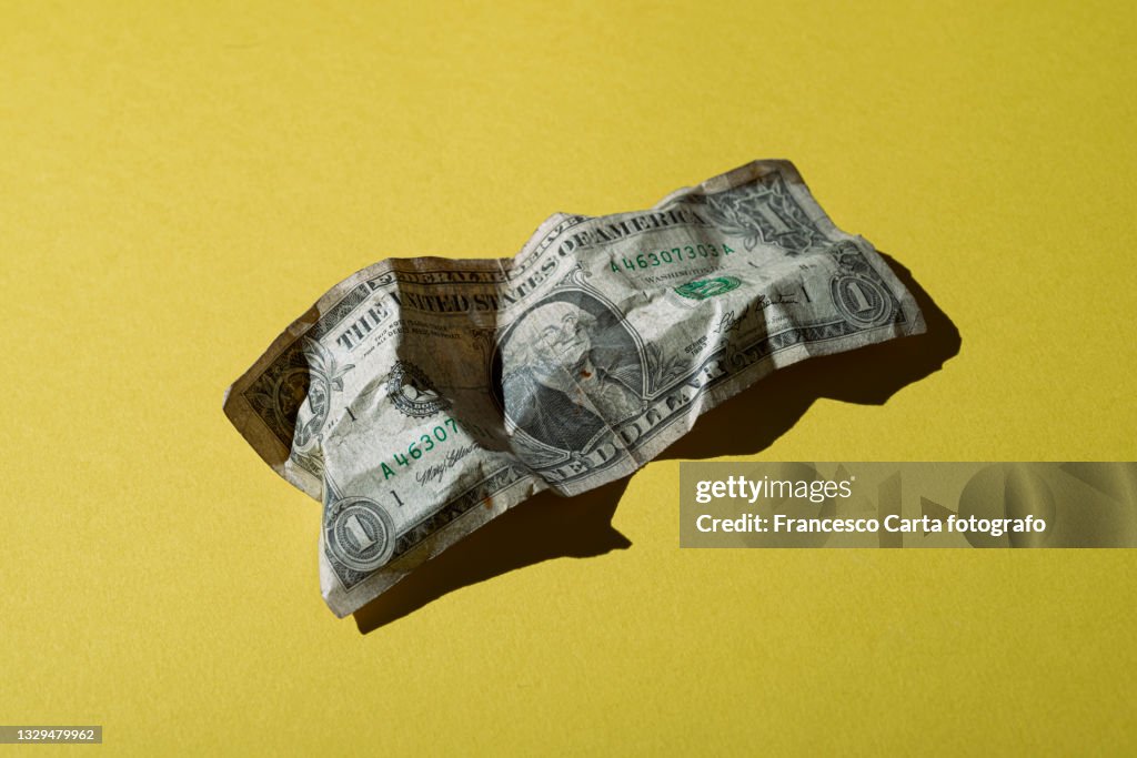 Crumpled 1 dollar note