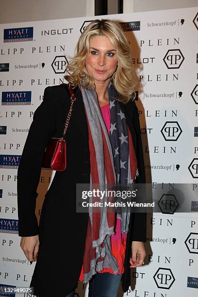 Claudelle Deckert arrives on the red carpet at Grand Store Opening 'Philipp Plein' on November 15, 2011 in Duesseldorf, Germany.