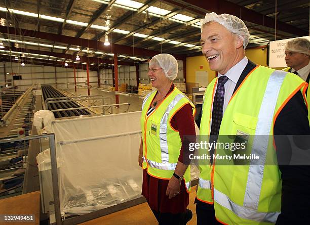 Labour Party leader Phil Goff meets workers on the Kiwifruit packing lines at the Trevelyan Kiwi Fruit Orchard on November 16, 2011 in Te Puke, New...