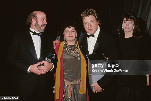 American television writer Bill Pentland, his wife American comedian Roseanne Barr, American actor John Goodman, and his partner, Annabeth Hartzog,...