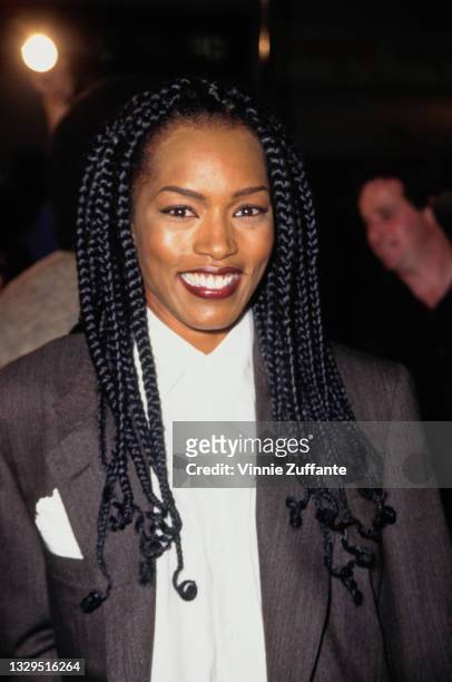 American actress Angela Bassett attends the premiere of 'Strange Days', held at the Mann Village Theatre in Los Angeles, California, 10th October...