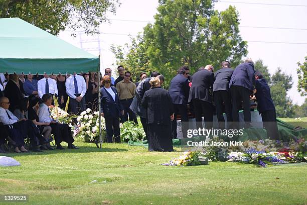 Pallbearers set down the coffin of Matthew Ansara, the son of actress Barbara Eden, July 2, 2001 at Ansara''s funeral in Hollywood, CA. Matthew...