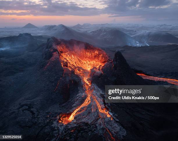 aerial view of volcano crater lava with steam,fagradalsfjall,iceland - fagradalsfjall stock pictures, royalty-free photos & images