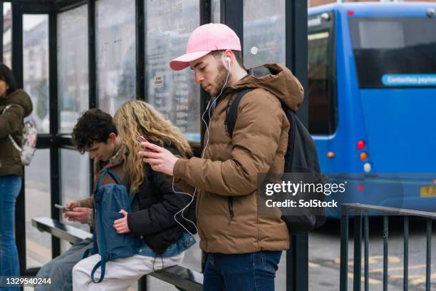 Bus Stop Queue Photos and Premium High Res Pictures - Getty Images