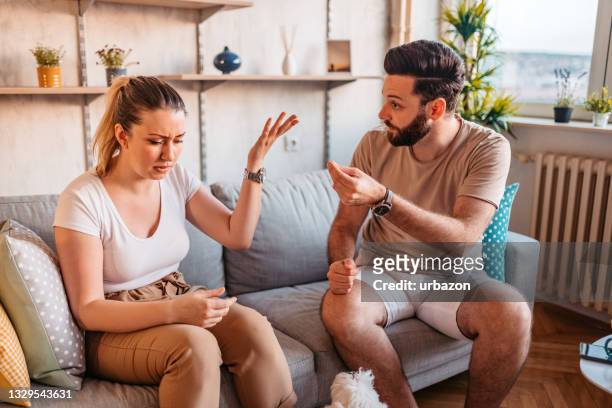 couple are quarreling at home - couple relationship difficulties stock pictures, royalty-free photos & images