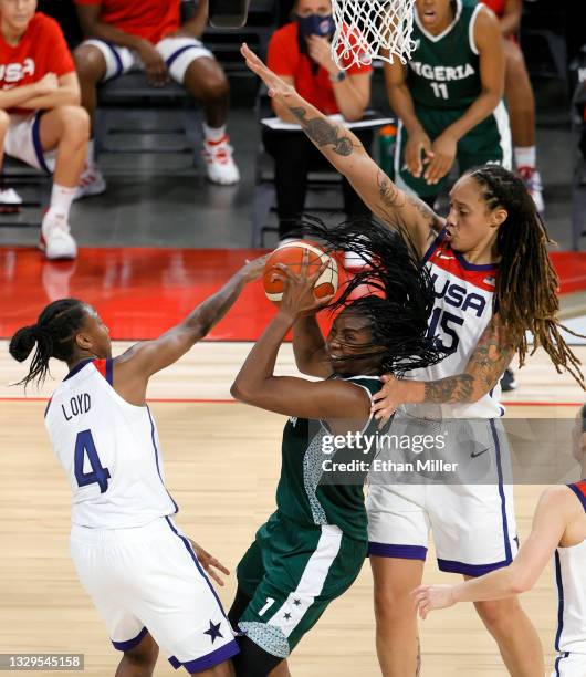 Elizabeth Williams of Nigeria is defended by Jewell Loyd and Brittney Griner of the United States during an exhibition game at Michelob ULTRA Arena...