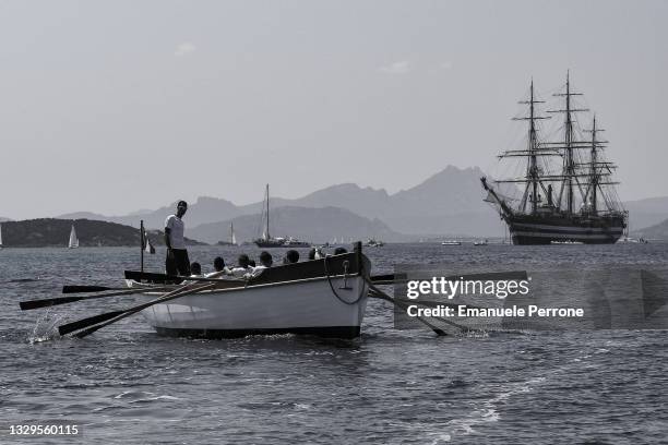 Amerigo Vespucci officers' students train with rowing boats while Amerigo Vespucci training ship is moored in the bay of La Maddalena in Sardinia on...