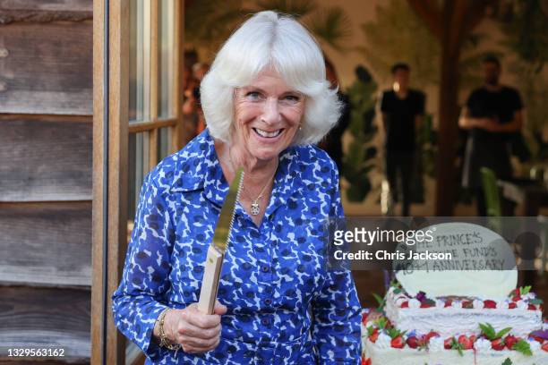Camilla, Duchess of Cornwall prepares to cut a cake to mark the “ten plus one” anniversary of the Prince’s Countryside Fund, recreating a celebration...
