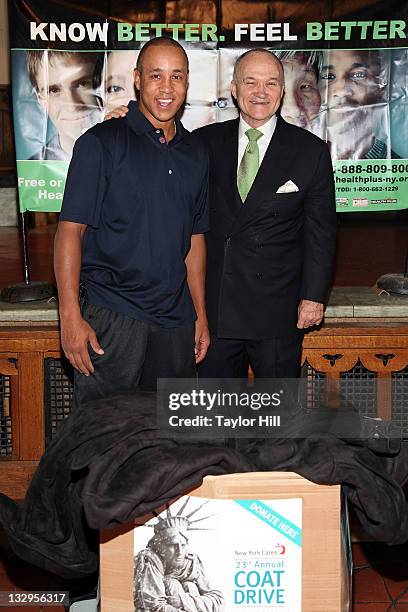 Player John Starks and NYPD Commissioner Ray Kelly attend the 23rd Annual New York Cares Coat drive at The Bowery Mission on November 15, 2011 in New...