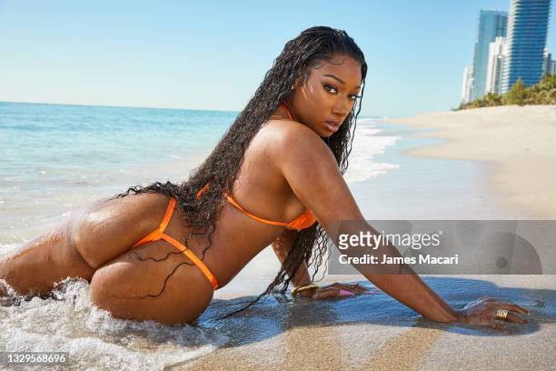 Swimsuit Issue 2021: Rapper Megan Thee Stallion poses for the 2021 Sports Illustrated swimsuit issue on April 13, 2021 in Hollywood, Florida....