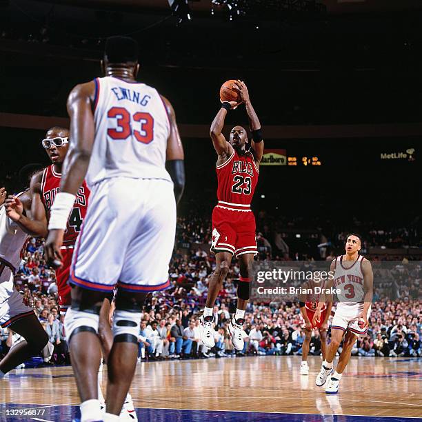 Michael Jordan of the Chicago Bulls shoots against the New York Knicks circa 1991 at Madison Square Garden in New York. NOTE TO USER: User expressly...