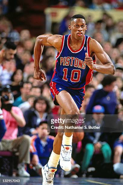 Dennis Rodman of the Detroit Pistons runs against the New York Knicks circa 1991 at Madison Square Garden in New York. NOTE TO USER: User expressly...