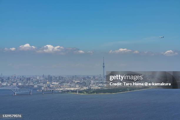 the airplane flying over tokyo of japan aerial view from airplane - tokyo bay stock pictures, royalty-free photos & images