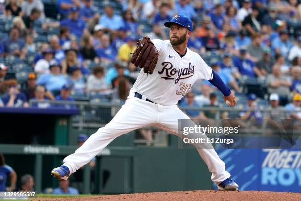 Danny Duffy of the Kansas City Royals throws in the first inning against the Baltimore Orioles at Kauffman Stadium on July 16, 2021 in Kansas City,...