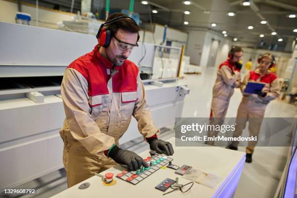Production Control Operators Manufacturing Plant Operator Photos and Premium High Res Pictures ...