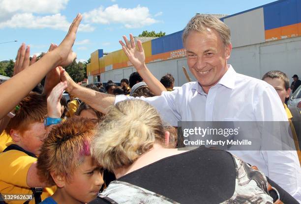 Labour Party leader Phil Goff meets young members of Kawerau Intermediate school as they protest to save their school during a campaign visit on...