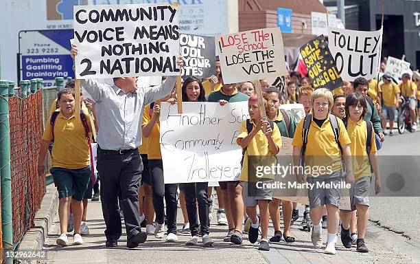Young members of Kawerau Intermediate school protest to save their school during a campaign visit by leader of the Labour party Phil Goff on November...