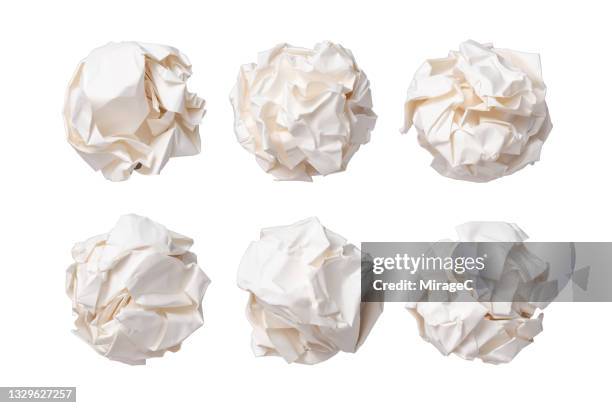 white crumpled paper balls isolated on white - verknittertes papier stock-fotos und bilder