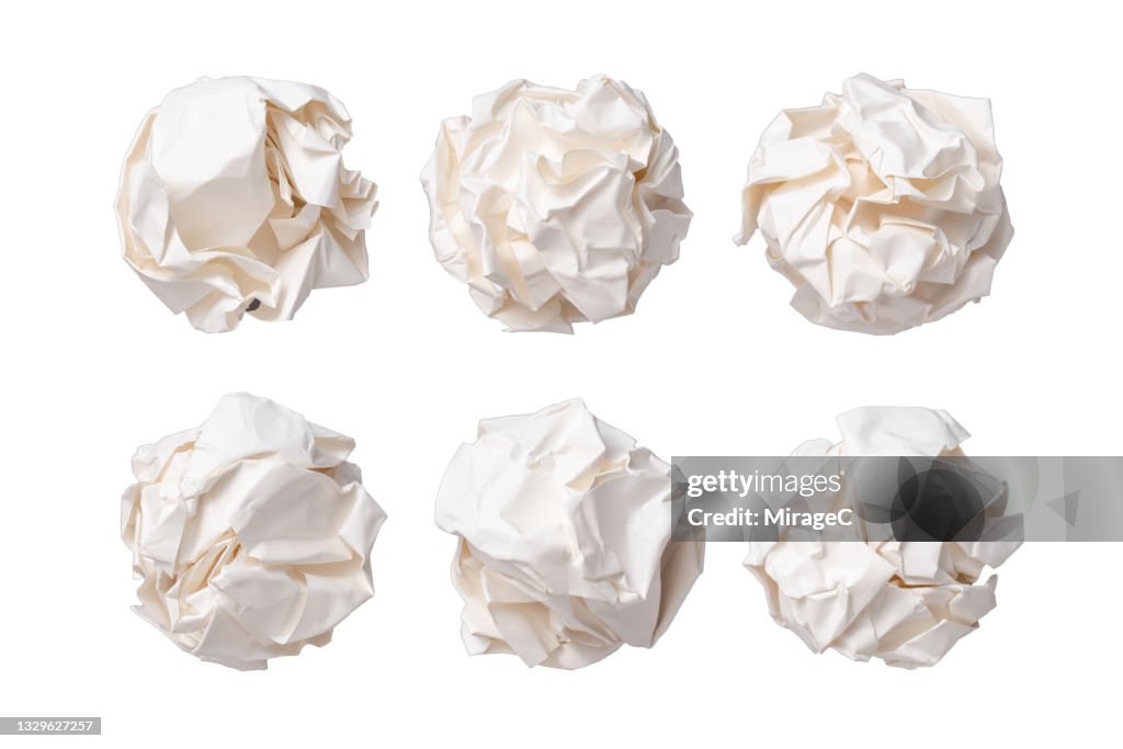 White Crumpled Paper Balls Isolated on White