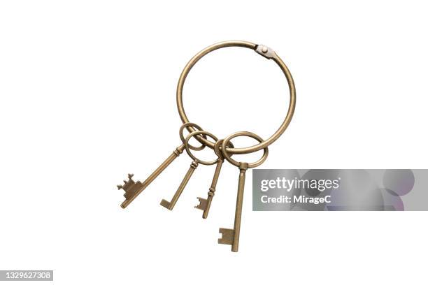 keychain with old keys isolated on white - old fashioned key stock pictures, royalty-free photos & images