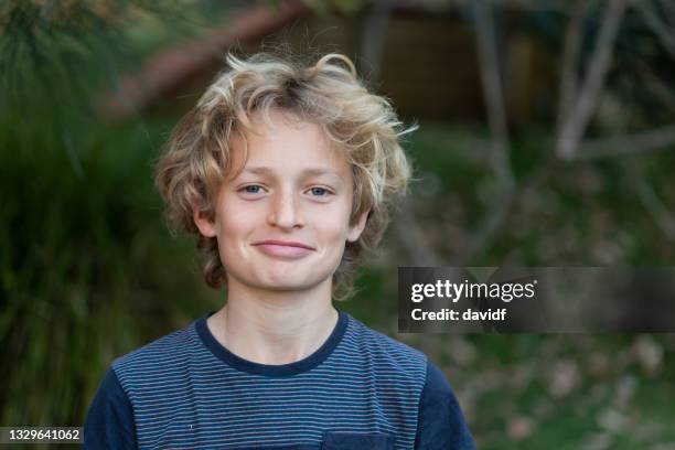 portrait of a happy teenage boy - handsome teenage boys stock pictures, royalty-free photos & images