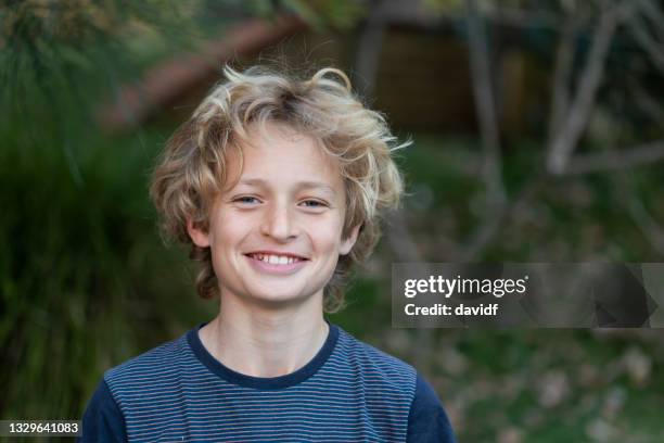 portrait of a happy teenage boy - blonde boy stock pictures, royalty-free photos & images