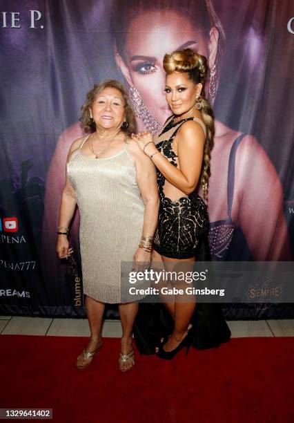 Betty Pena and her daughter, Jennifer Lopez tribute artist Connie Pena, attend the debut of Connie Pena's music video "Clasico" at Blume Kitchen &...