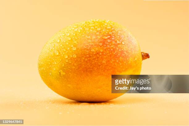 sweet tropics fruits photo with studio lighting. - mango fruit stock pictures, royalty-free photos & images