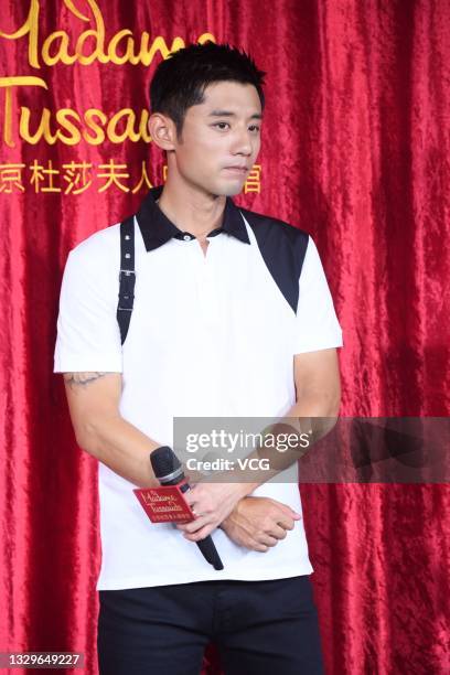 Table tennis player Zhang Jike attends the unveiling ceremony of his wax figure at Madame Tussauds Beijing on July 20, 2021 in Beijing, China.