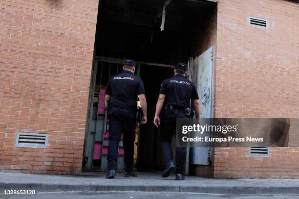 Agents of the National Police enter a building on Jose Garrido Street that was squatted, on 20 July, 2021 in Madrid, Spain. Agents of the National...