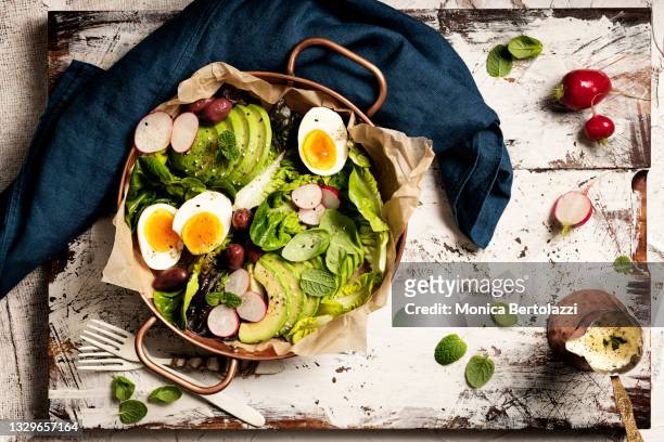 radish, eggs and avocado salad - salad bowl stock pictures, royalty-free photos & images