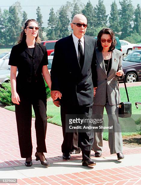 : Actor Michael Ansara walks with his wife Beverly ,right, and his late son''s fiancee Leanna Green, left, as they arrive at the Forest Lawn Cemetery...