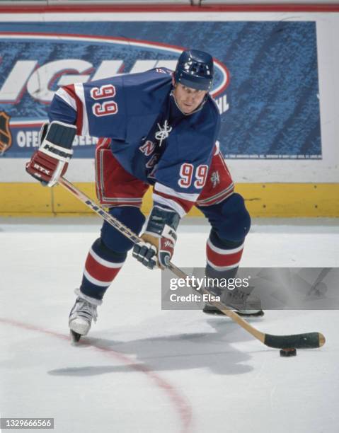 Wayne Gretzky, Center for the New York Rangers in motion on the ice during the NHL Western Conference Pacific Division game against the Mighty Ducks...