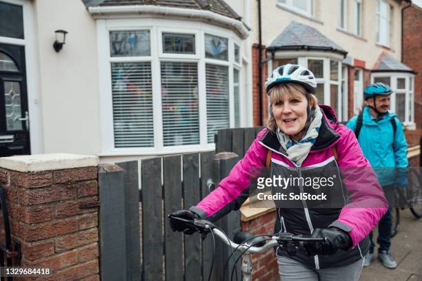 exercising on a bike - cycling uk stock pictures, royalty-free photos & images