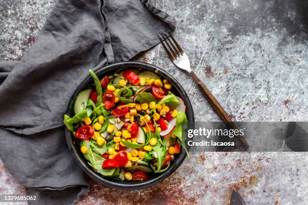 bowl of colourful salad - arugula stock pictures, royalty-free photos & images