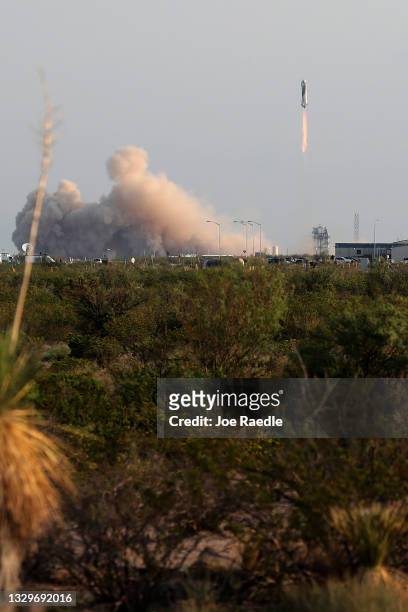 The New Shepard Blue Origin rocket lifts-off from the launch pad carrying Jeff Bezos along with his brother Mark Bezos, 18-year-old Oliver Daemen,...