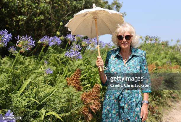 Camilla, Duchess of Cornwall smiles during a walk on Bryher Island on Day 2 of her visit to Devon and Cornwall with Prince Charles, Prince of Wales...