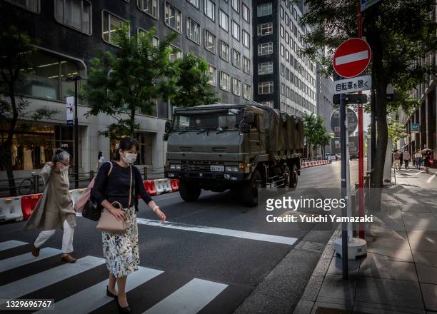 Japan self-defense force vehicle arrives at Tokyo International Forum, one of the Tokyo 2020 Olympics venues on July 20, 2021 in Tokyo, Japan. With...