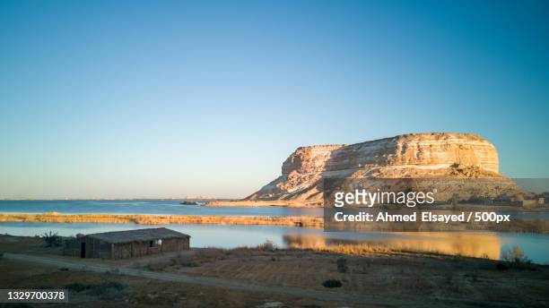 scenic view of sea against clear blue sky,siwa oasis,egypt - siwa photos et images de collection