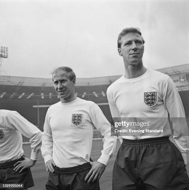Bobby Charlton of Manchester United and his brother Jackie Charlton of Leeds United pose with the rest of the England team ahead of a British Home...