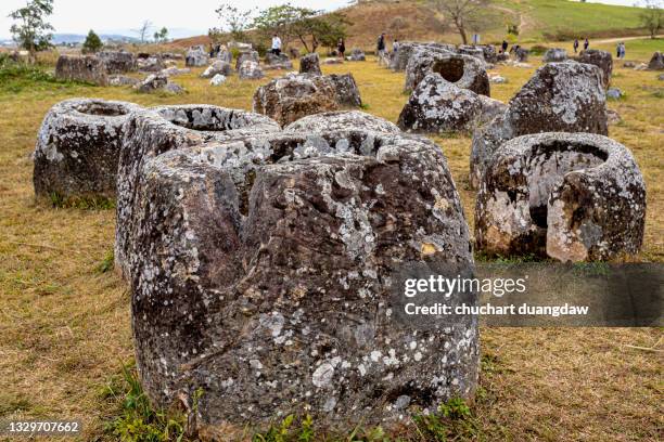 plain of jars in the province xieng khuang in north lao in southeast asia - plain of jars stock pictures, royalty-free photos & images