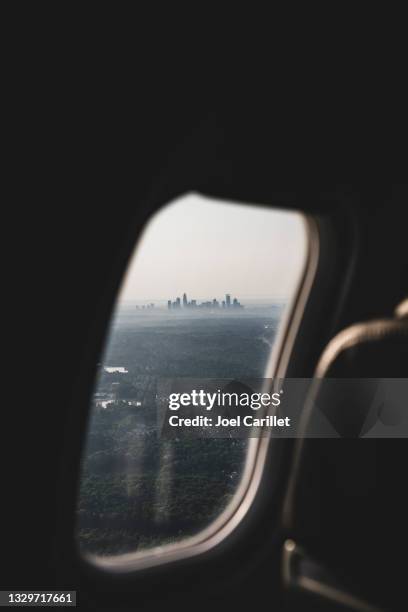 charlotte skyline seen from airplane window - charlotte north carolina summer stock pictures, royalty-free photos & images
