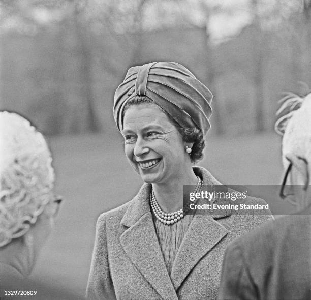 Queen Elizabeth II during the presentation of the colours to the 1st Battalion Welsh Guards in the grounds of Buckingham Palace, London, UK, 11th May...