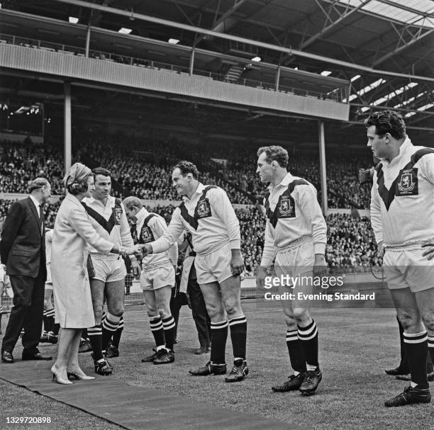 Princess Alexandra, The Honourable Lady Ogilvy meets the Hunslet rugby league team who are taking on Wigan in the 1964-65 Challenge Cup final at...