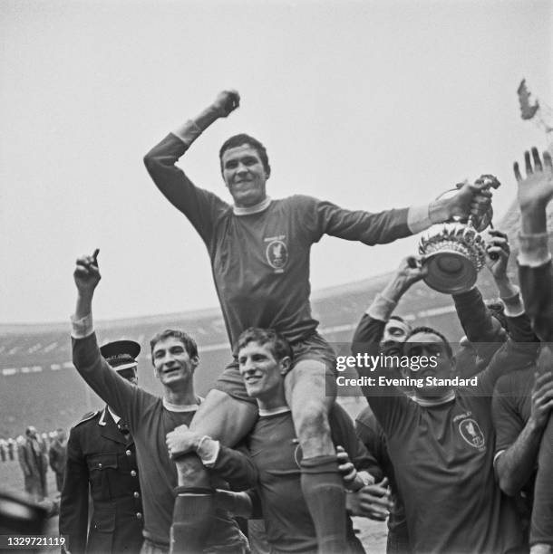 Ron Yeats, captain of Liverpool FC, is carried by his teammates after they won the 1965 FA Cup final at Wembley Stadium in London, UK, 1st May 1965....