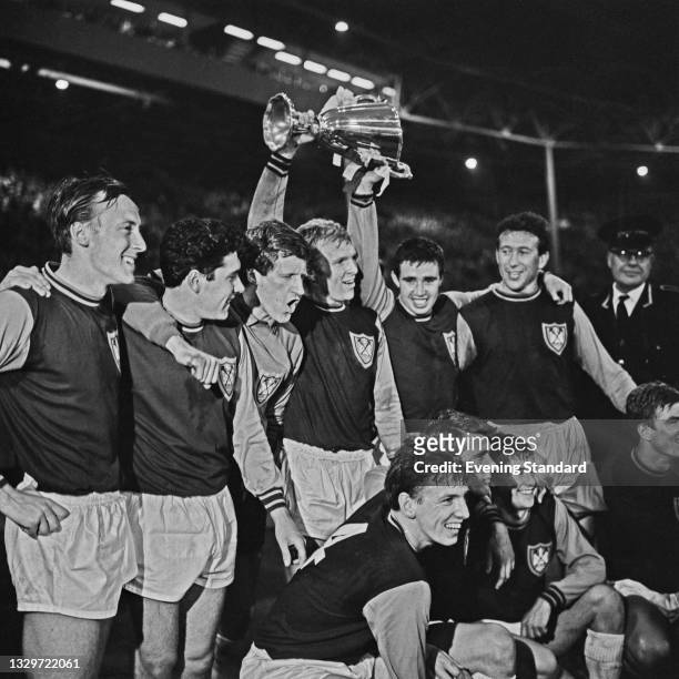 Members of West Ham United holding the European Cup Winners' Cup after beating TSV 1860 Munich in the final at Wembley Stadium, London, UK, 19th May...