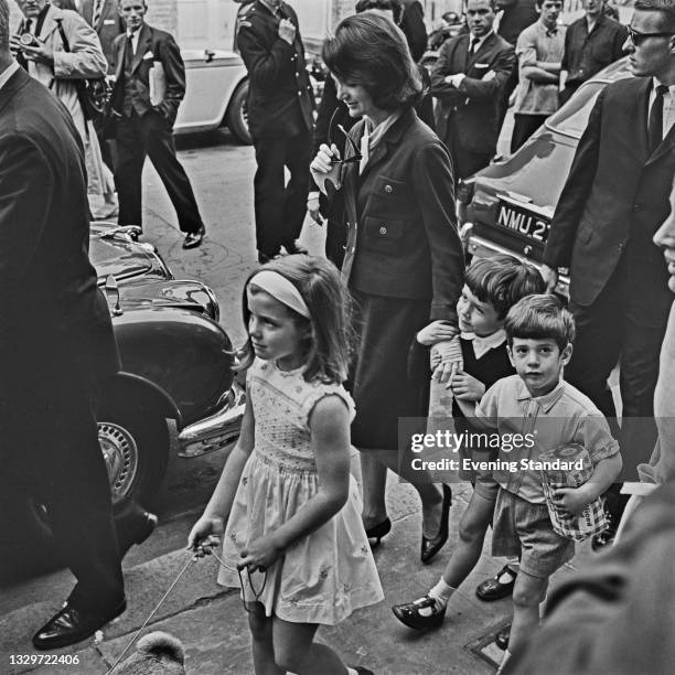 Jacqueline Kennedy , the widow of former US President John F. Kennedy, with her son John F. Kennedy Jr. , daughter Caroline Kennedy and nephew...